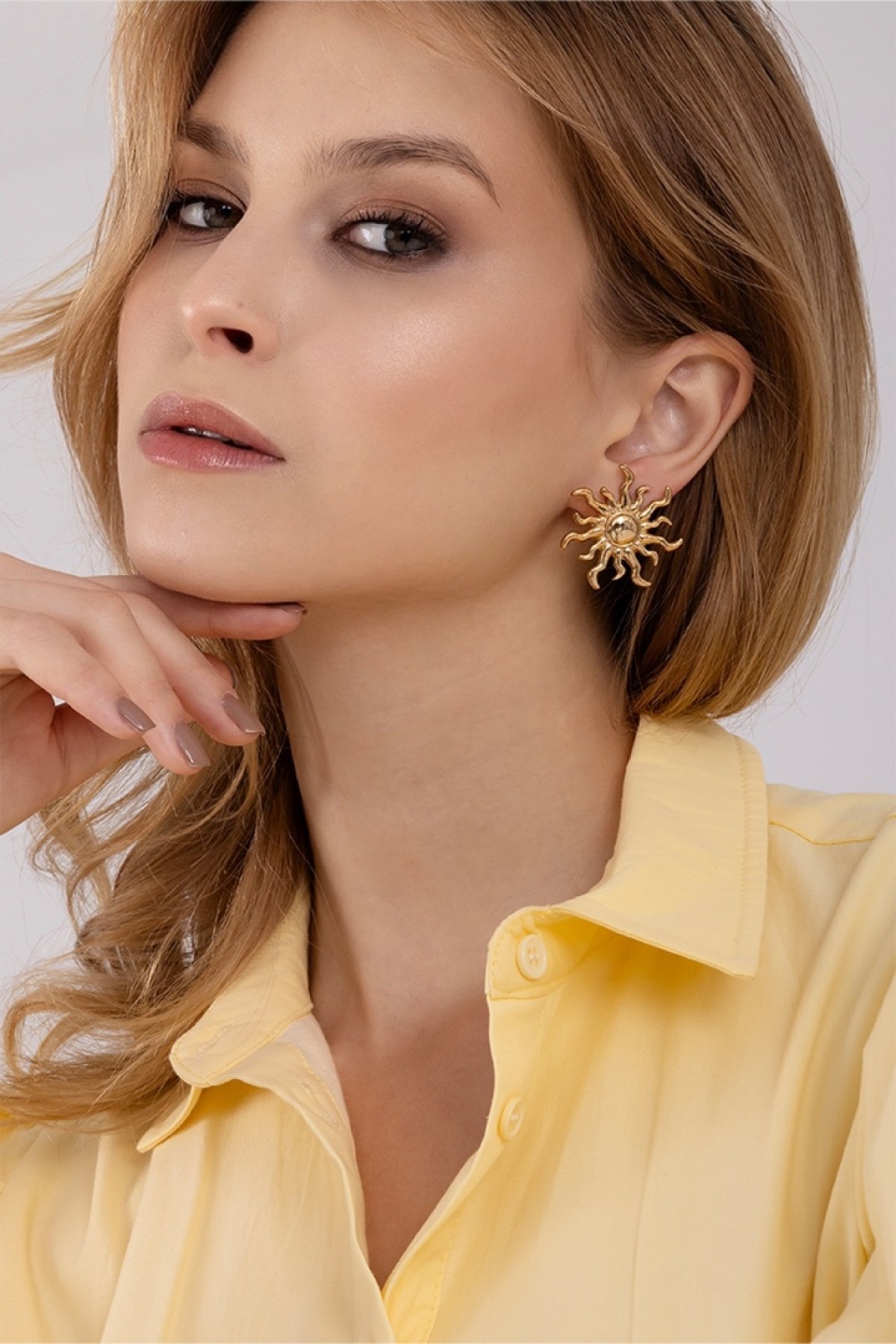Gold sun earrings 